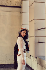 Stylish young girl in an autumn look