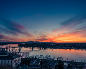 Fototapeta premium Sunsest above Sturovo from Esztergom, Hungary