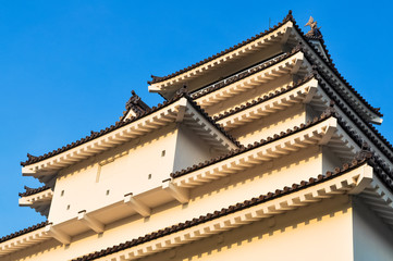 Fototapeta na wymiar Looking up Wakamatsu Castle in Japan