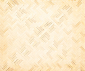 Old bamboo straw wood mat texture  in interlace seamless shaped patterns for light brown background