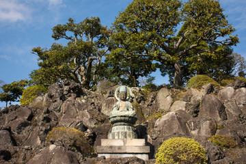 Guanyin or Guan Yin bodhisattva goddess statue in Daitou Great Peace Pagoda of Naritasan Shinshoji Temple for people visit praying at Chiba in Tokyo, Japan