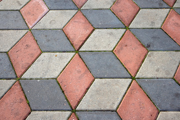 Ground tiles forms decorative pattern pavement