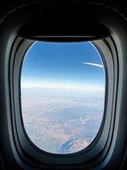 Naklejka premium Porthole on the plane