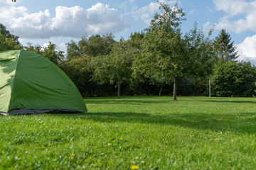 Camping on the farm in the Apple orchard, eco-tourism. European camping