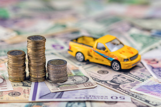 Car and money concept. Selective focus image with shallow depth of field