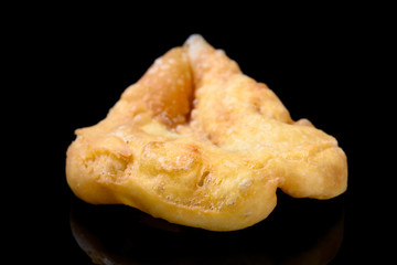 Chinese style deep fried doughnut on a black background