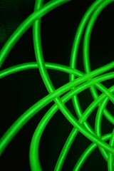 Toxic green luminous wires with different shapes and structures. A web of lime fiber and unusual...