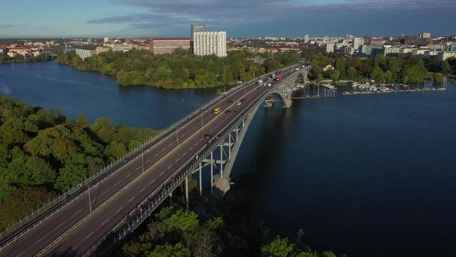 Aerial view of cyclists crossing bridge Vasterbron, Stockholm, Sweden.