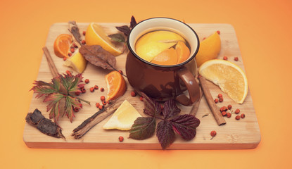 Cup of tea in the autumn decoration.