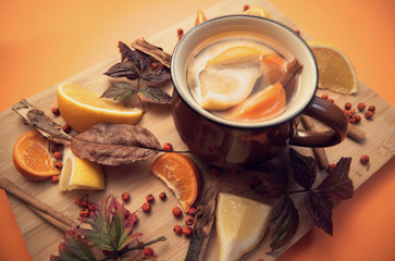 Cup of tea in the autumn decoration.