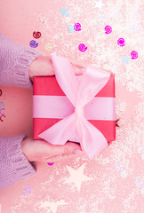Gift box on a beautiful pink background . Holiday concept