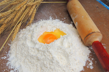 flour, eggs and rolling pin