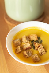 pumpkin cream soup with croutons.