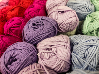 Fototapeta na wymiar Multi-colored yarn. Different shades. Soft. Shopping for