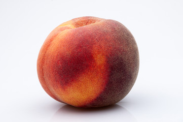 Ripe peach fruit isolated on white