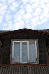 old white wooden roof window