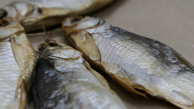 Dried Salt Fish Kraft Paper Background Panning Slider Shot.