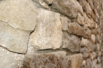  old gray stone wall perspective view for background