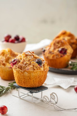 Christmas homemade cranberry muffins. Christmas cake on New Year's background. Copy space.