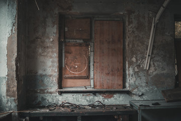 Fototapeta na wymiar wooden windows in abandoned building