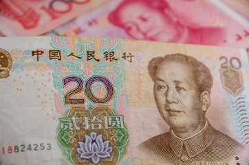 Chinese money, close-up. Yuan for the background.