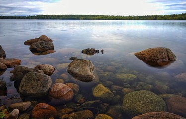 Rocks in still lake