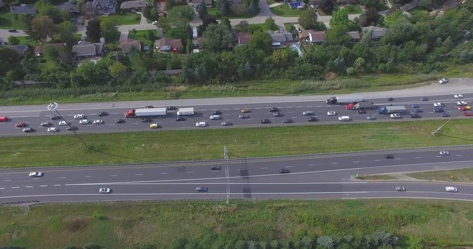 birds eye view drone footage of a busy highway.