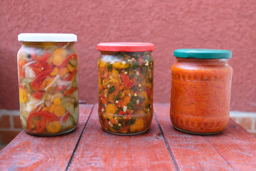 glass jars of homemade pickled vegetables 
