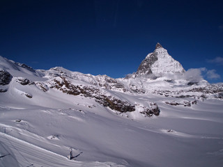 Fototapeta na wymiar Landscape. Scenic view on snowy Matterhorn with blue sky in Zermatt, Switzerland