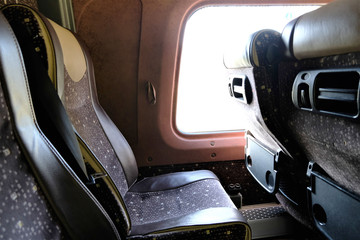 Fototapeta na wymiar passanger seats on a long distance bus with a window