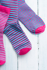 striped socks on white wooden