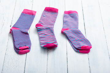 striped socks on white wooden