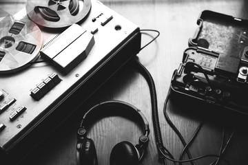 Reel tape recorder for wiretapping. Field telephone set USSR is lying nearby.  KGB spying...