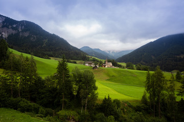 Obraz premium View of the Italian village of Santa Maddalena. Perfect landscape with mountains