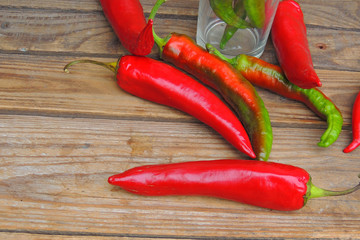 chili peppers in a glass