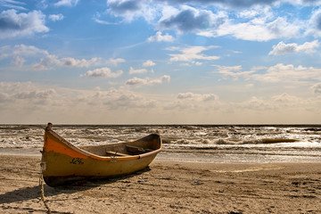 old fishing boat on the beach