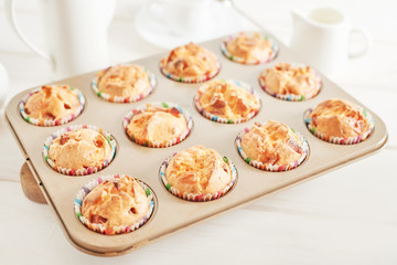 ham and cheese muffins on white wooden background