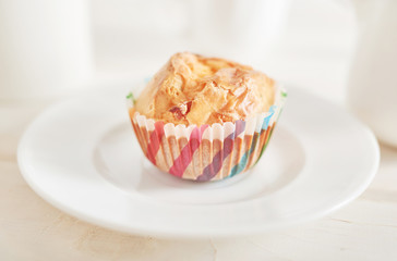 ham and cheese muffins on white wooden background