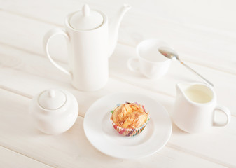 ham and cheese muffins on white wooden background
