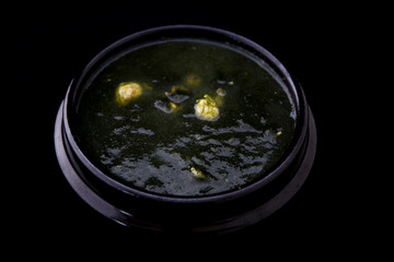 Seaweed fulvescens with oyster soup which is called Maesaengi guk, Korean seaweed soup