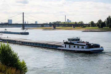 Obraz premium Cargo ship. International logistics. Delivery of goods. Dusseldorf. Germany
