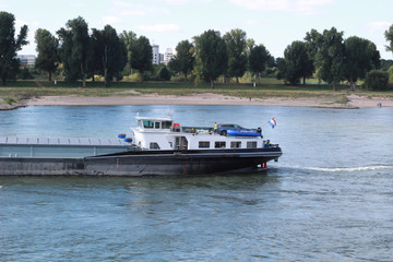 Obraz premium Cargo ship. International logistics. Delivery of goods. Dusseldorf. Germany