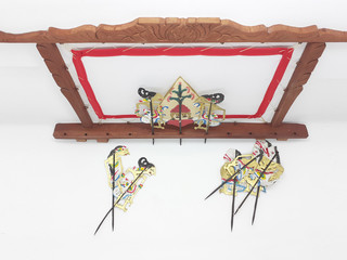Indonesian Traditional Ethnic Artistic Vintage Handmade Leather Shadow Puppet in White Isolated...