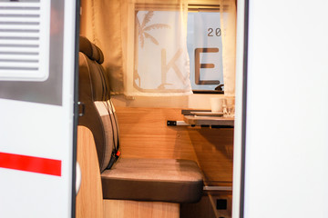 House on wheels. Caravan. Details. Kitchen and utensils. Bedroom and beds. Driver's seat.Campervan.Camper inside