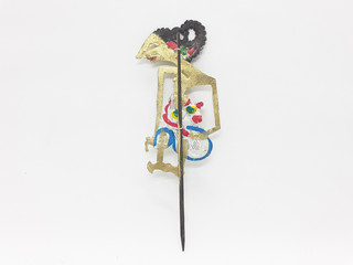 Indonesian Traditional Ethnic Artistic Vintage Handmade Leather Shadow Puppet in White Isolated...