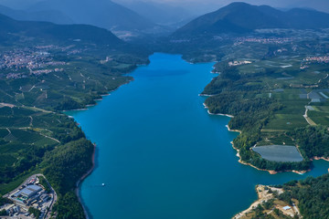 Aerial view Lake Santa Giustina, Castel Cles, bridge over the lake. North of Italy.