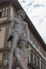White sculpture Hercules and Cacus at the entrance of the Palazzo Vecchio in the Piazza della Signoria, Florence, Italy.
