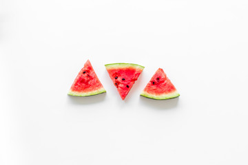 Cut watermelon for break with fruit on white background top view