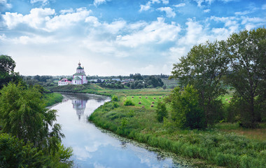 Fototapeta na wymiar Church of Elijah the Prophet on the bank of the river Kamenka - Suzdal Russia