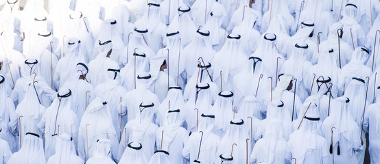 A traditional arabian dance performed by a group of emirati men 